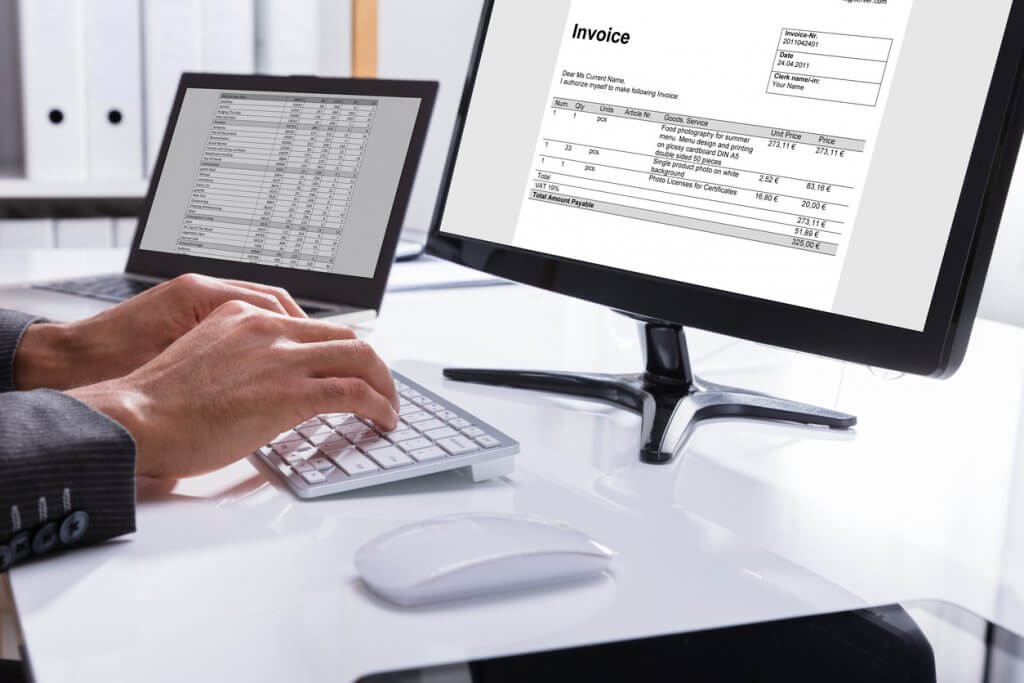 businessman using Concur Invoice to automate invoice management